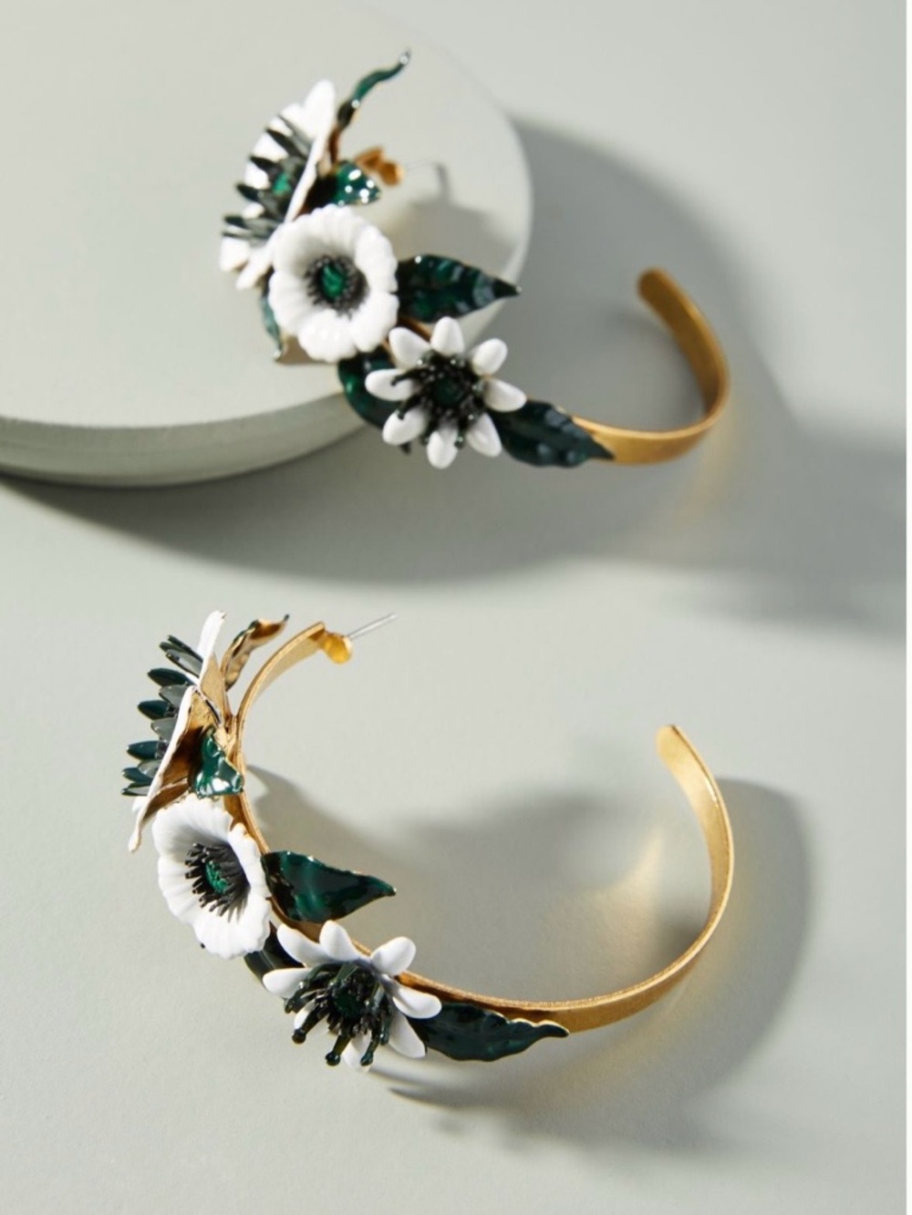 Elizabeth Cole Axel Gold Floral Hoop Earrings with White & Green Enamel Flowers